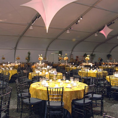 The tented space featured 46 ficus trees and soft, rose-colored lighting.