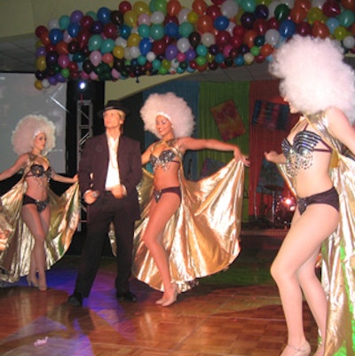 The Rolling Stones inspired the finale, which sent dancers roaming through the crowd in skimpy black and gold costumes.