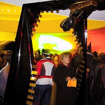 Guests entered the lobby of the Solomon R. Guggenheim Museum for the High Style Halloween ball through a larger-than-life zipper created by Lorelei Guttman Design Studio.