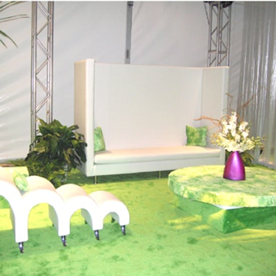 Funky furniture vignettes in white and lime green lent a cool Miami Beach vibe to the reception.
