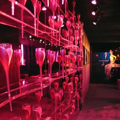 Event designer Jeffrey Marcus of JMVisuals took Moët & Chandon’s pink tulip-shaped champagne flutes and arranged them along curvy acrylic ledges for a novel wall installation.