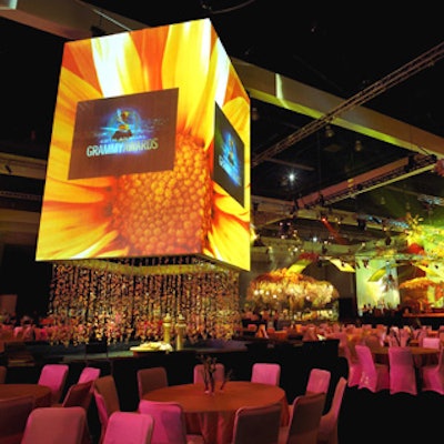 A cube-shaped chandelier served as a projection surface for changing seasonal imagery and magnified views of the stage.