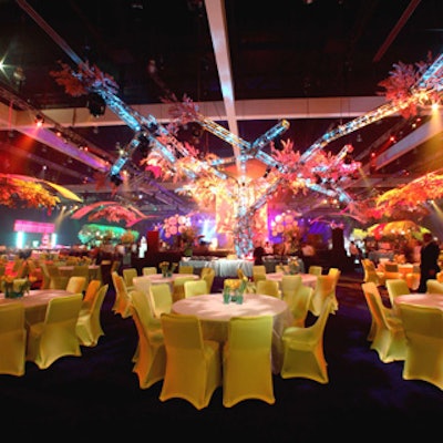 A 30- by 60-foot cherry blossom tree woven with creeping vines filled the center of the space.