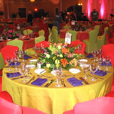 Round tables were adorned with floral centerpieces from conceptBAIT for a festive, colorful look.