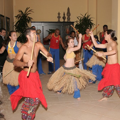 Maculele dancers surprised guests by suddenly appearing at the reception to perform an ancient Brazilian war dance.