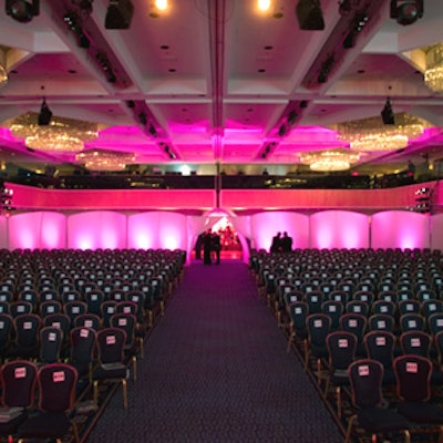 Pink Inc.'s tension fabric walls surrounded the awards presentation's theater-style seating. New City Video & Staging washed the walls during the pre-awards reception with blue light to match the color of the event's invitation.