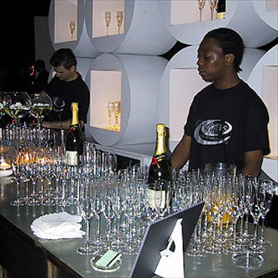 Bartenders from Cipriani served champagne and martinis from a bar designed by Designs by Douglas.