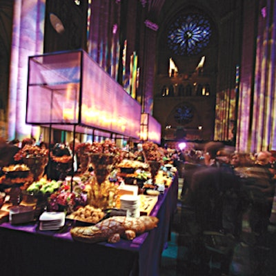 The Cathedral of St. John the Divine made for a visually arresting venue for a Hackensack University Medical Center event in October—especially lit in purple by Frost Lighting. David Beahm added impact with his oversize lanterns filled with candles and covered with a flame-proof, shimmering fabric standing over the abundant buffets.