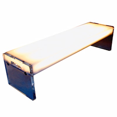 This new illuminated bench doubles as a low table. The piece measures 12 1/2 inches high by 52 inches wide by 14 inches deep, and rents for $250. Available from Modprop.com.