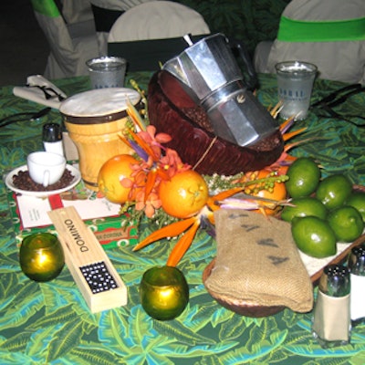 Designs by Sean arranged bongos, coffee beans, dominoes, and more in the centerpieces for the Cuban-themed tables.