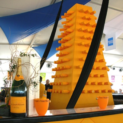 Veuve Clicquot had an awesome presence with its bright orange booth.