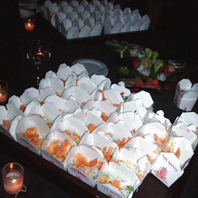 Guests nibbled Chinese food from cardboard take-out containers.