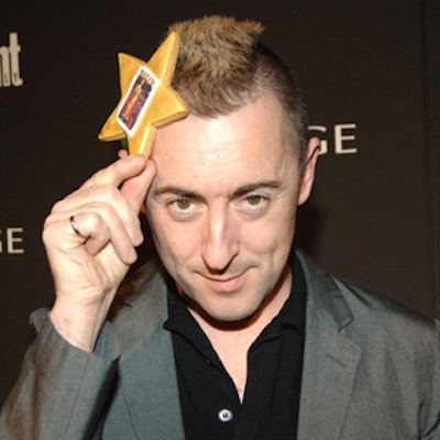Alan Cumming and other guests took star-shaped treats from Eleni's Cookies at the Entertainment Weekly party.