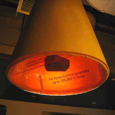 Outsized cones hung from the ceiling contained speakers that played cyclone sound effects.