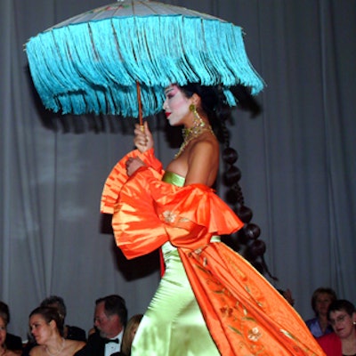Designer Tome created a gown inspired by Memoirs of a Geisha for a fashion show during the Book Lover's Ball at the Liberty Grand.