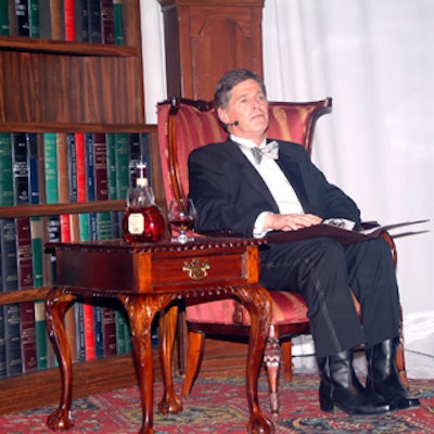 Gord Martineau, anchor of City TV's CityNews at Six, sat in a library vignette from the Aragon Group while narrating the fashion show.