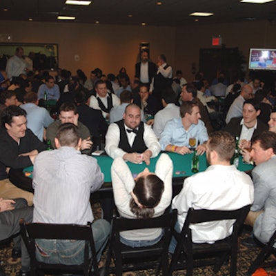 Guests played Texas Hold 'em poker with dealers from Tumbling Dice Entertainment on the lower level.