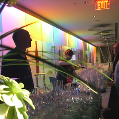 At American Idol’s all-American party for its top 12 contestants at the Pacific Design Center, lighting illuminated the bars in rainbow colors.