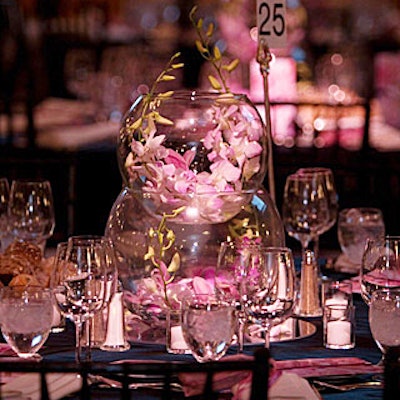 Match Catering and Eventstyles filled the Waldorf-Astoria with pale pink blooms for the March of Dimes Beauty ball. Two large, stacked fish bowls filled with orchid stalks decorated some of the tables.