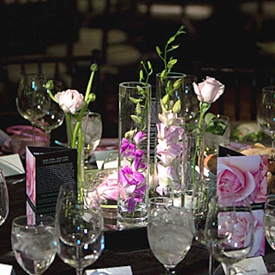 A few pink stems in an assortment of vases decorated the other tables.