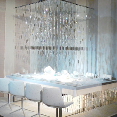 Architecture and interior design firm Gabellini Sheppard Associates worked with Swarovski crystal and B&B Italia furniture to create a sparkling silver-and-white fantasy that incorporated shimmering carpet, a geometric chandelier and—most dramatically—a spread of jewel-like crystals that covered the tabletop.