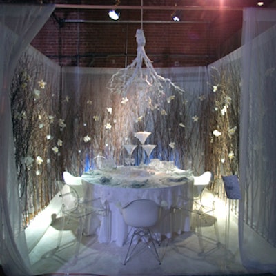 It felt like winter within interior designer Vicente Wolf's dining room, which featured falling (faux) snow. Inspired by The Chronicles of Narnia, the table was surrounded by a row of tall birch branches.