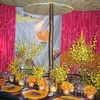 Interior designer Jamie Drake channeled the lush exoticism of Phuket and Bangkok, using Bergamot's spring line of fabric. The table's environment included a traditional Thai dancer's headdress, a mural of sampans, and gilt touches that echoed Thailand's golden temples.