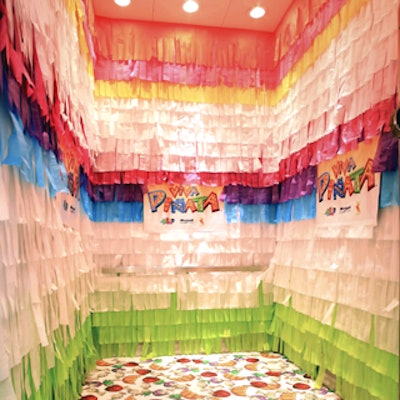 Zed Ink decorated the interior of one of Splashlight's elevators with colorful paper fringe—like those found on piñatas—for the Viva Piñata press conference.