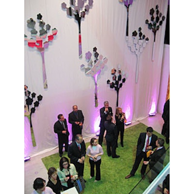 At Veuve Clicquot's rosé launch at the Y Apartment in New York, a 25-foot-tall sheer white curtain hung with mirrored tree cutouts that towered over the lower level.