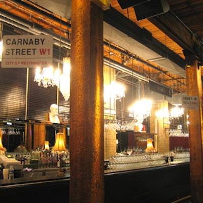 Signs hung from the ceiling indicating famous streets and places in London, such Carnaby Street, were part of the party d?cor.