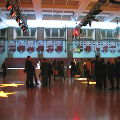 Bernhard-Link projected the Converse star logo onto the floor of the Xavier High School gymnasium for the John Varvatos for Converse fashion show.