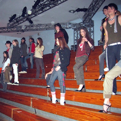 Models struck disaffected poses on the gym's bleachers.