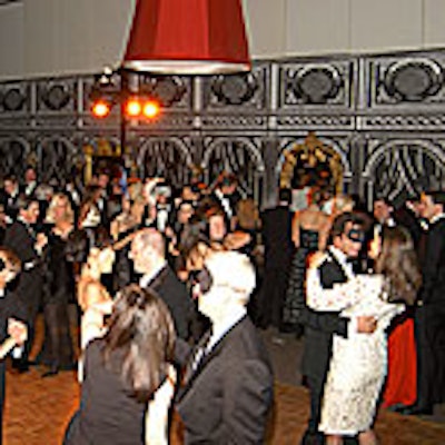 People let their hair down at Christie's Black and White ball.