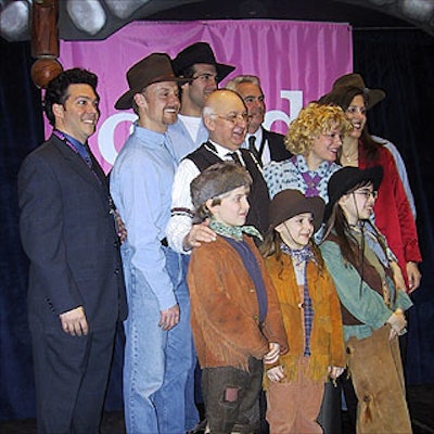 After performing a few songs from the show, cast members from Annie Get Your Gun posed with executives from Child magazine.