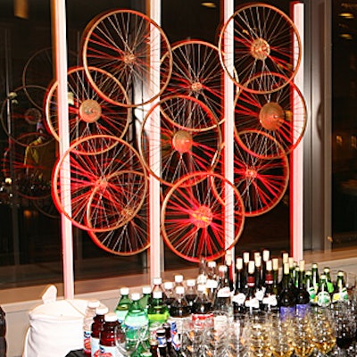 For the premiere of Wired to Win: Surviving the Tour de France, Liz Sanzo of Events by Liz and Shara Maso of Maso Enterprises created an eight-foot-tall bicycle wheel sculpture to decorate the back of the bar.