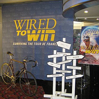 A vintage bicycle from East Village bike shop Classic Restorations and white directional signs decorated the entryway to the reception area.