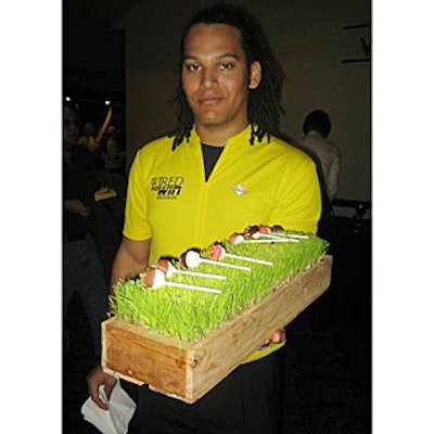 Caterwaiters from Indiana Market wore yellow jerseys-like those won by Tour de France stage winners-served cheesecake lollipops from wheatgrass-covered trays.