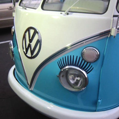 The bus is painted in Bliss's signature style, and features eyelashes painted over the headlights.
