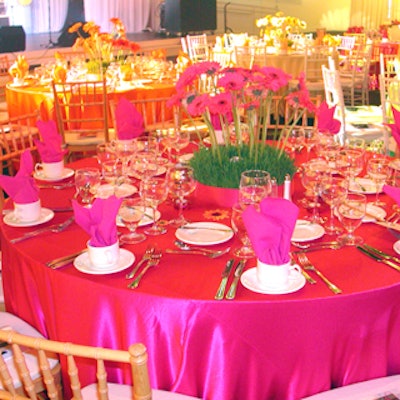 SHOWORKS dressed tables in bright spring colors and lots of daisies.