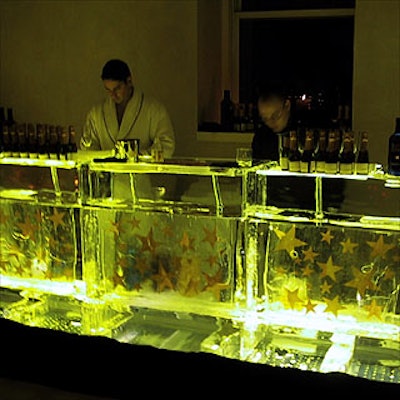 An ice bar held champagne and vodka for guests.