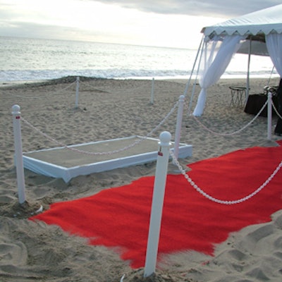 The red carpet sat right atop the sand.
