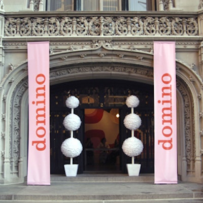 Domino's fund-raising auction and anniversary celebration gave the Ukrainian Institute a contemporary look using plain white paper, including topiaries from Leah Singer that flanked the mansion's entrance.