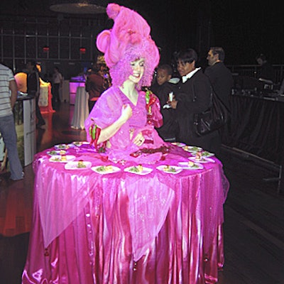 A model in a pseudo-Marie Antoinette costume was dressed to embody the pomegranate and pepper ingredients in the HairStay styling line.