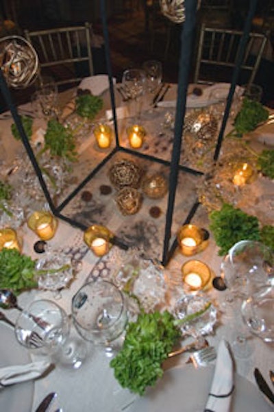 Gotham Gardens' striking table could have been a part of last year's avant-garde benefit, but plenty of golden objects and detailed drawings on the table covering made reference to the Renaissance and Golden Age theme.