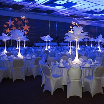 FOS Decor Centre decorated the Hilton Suites Toronto/Markham Conference Centre & Spa ballroom with white linen tablecloths and centrepieces topped with bouffant feather fronts for the Town of Markham's Mayor's Dinner for the Arts.