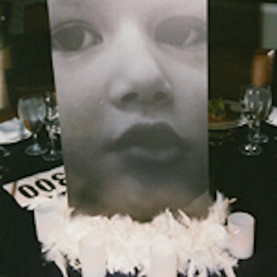 Boomdon created centerpieces featuring thin upright sheets of Plexiglass imprinted with images of children stricken by cancer for the fifth annual Pediatric Oncology Group of Ontario fund-raiser at Liberty Grand.
