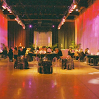 Track lighting lit the cavernous after-party room in glitzy Vegas colours.