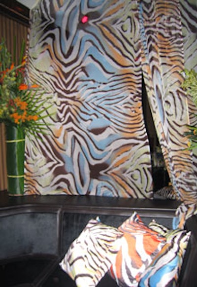 Ivan Luciani draped Just Cavalli 'Bora Bora' silk fabric over pillows and hung it from the ceiling.