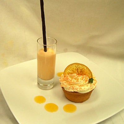 Dessert at the luncheon included a vanilla cupcake with orange sprinkles and a creamy, orange-flavored milkshake shot with a chocolate straw.