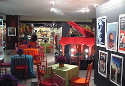 An exhibit of Elton John’s colorful memorabilia inspired an area with multicolored chairs and tables.